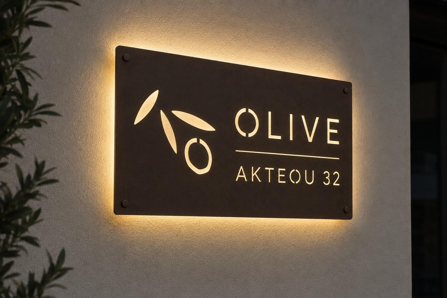 Illuminated Olive sign at Akteou 32